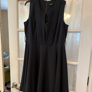 Navy fit and flare from City Chic; Square pleating over bodice